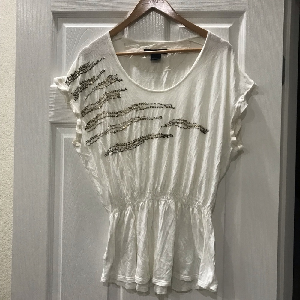 White with gold sequin CK top